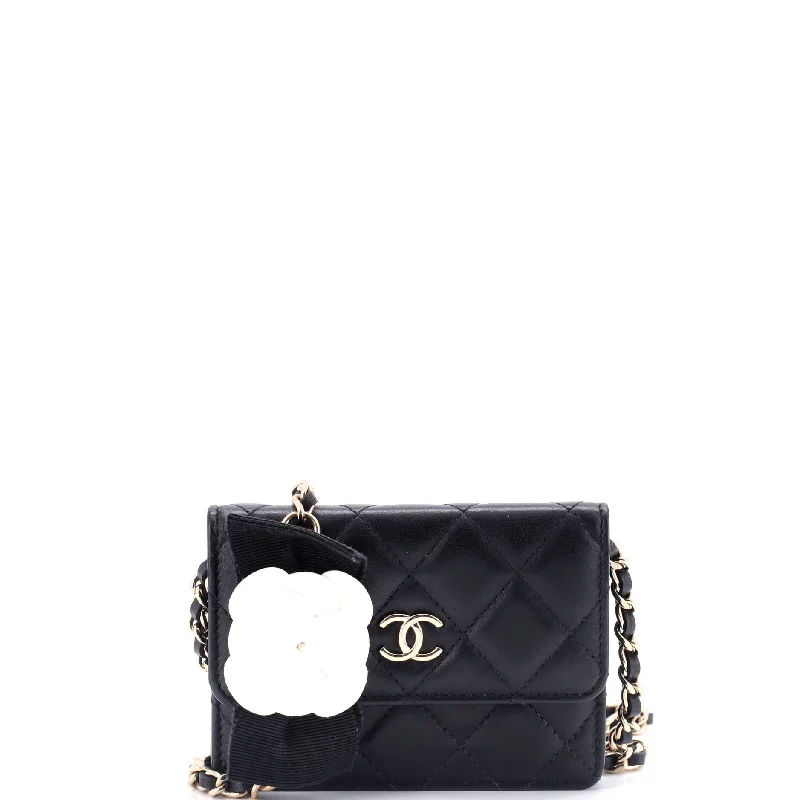 Women's money clip in a metallic sheen finishCamellia Bow Flap Card Holder with Chain Quilted Lambskin Women's money clip in a metallic sheen finishCamellia Bow Flap Card Holder with Chain Quilted Lambskin