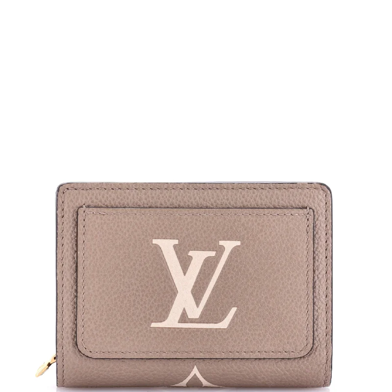 Women's money clip with a floral patternClea Wallet Bicolor Monogram Empreinte Giant Women's money clip with a floral patternClea Wallet Bicolor Monogram Empreinte Giant