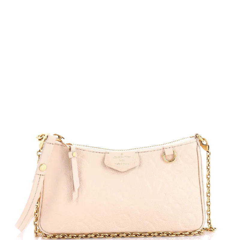 Women's money clip in a trendy geometric shape​Easy Pouch on Strap Monogram Empreinte Leather