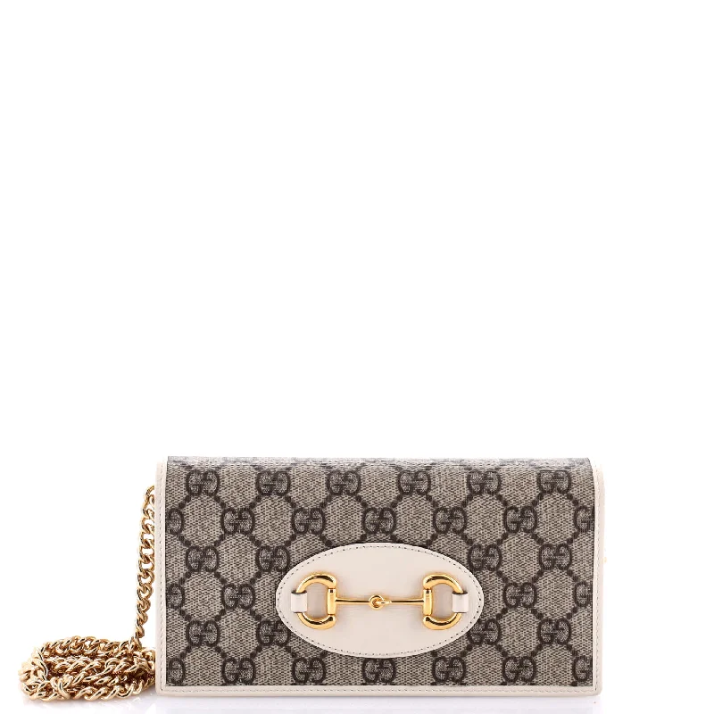 Women's money clip with a braided leather strapHorsebit 1955 Chain Wallet GG Coated Canvas Women's money clip with a braided leather strapHorsebit 1955 Chain Wallet GG Coated Canvas
