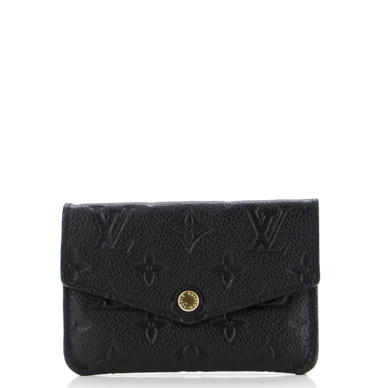 Women's money clip in a pastel color palette​Key Pouch Monogram Empreinte Leather