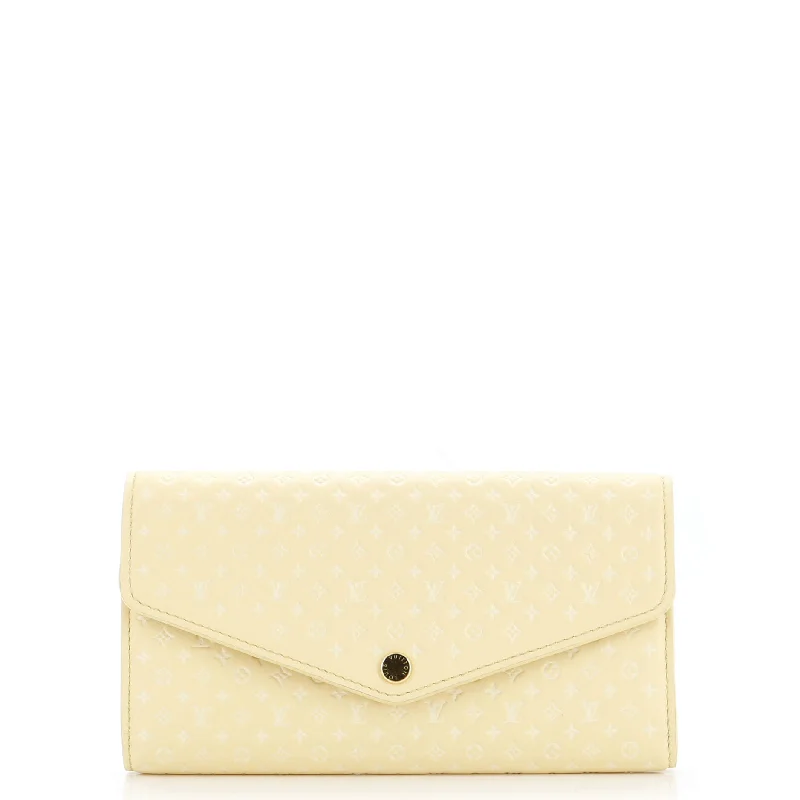 Women's money clip with a braided leather strapSarah Wallet NM Nanogram Embossed Leather Women's money clip with a braided leather strapSarah Wallet NM Nanogram Embossed Leather