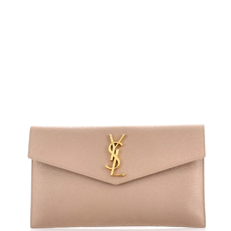 Women's money clip with a detachable charm​Uptown Pouch Leather
