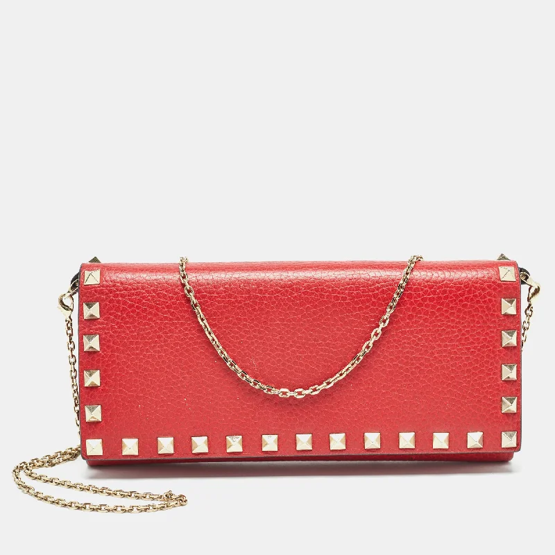 Women's leather money clip with embossed design​Valentino Red Leather Rockstud Flap Wallet On Chain