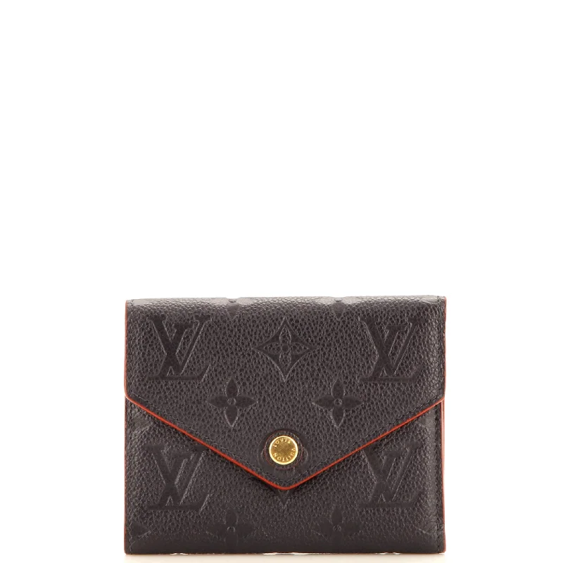 Women's money clip with a keychain attachmentVictorine Wallet Monogram Empreinte Leather Women's money clip with a keychain attachmentVictorine Wallet Monogram Empreinte Leather
