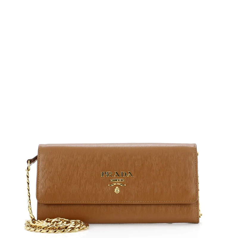 Women's money clip with a braided leather strap​Wallet on Chain Vitello Move