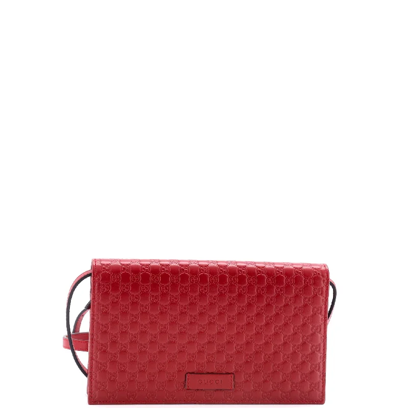 Women's leather money clip with embossed designWallet on Strap Microguccissima Leather Women's leather money clip with embossed designWallet on Strap Microguccissima Leather