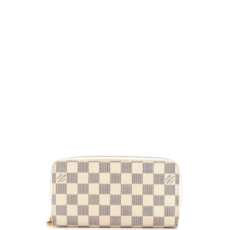 Women's leather money clip with embossed design​Zippy Wallet Damier