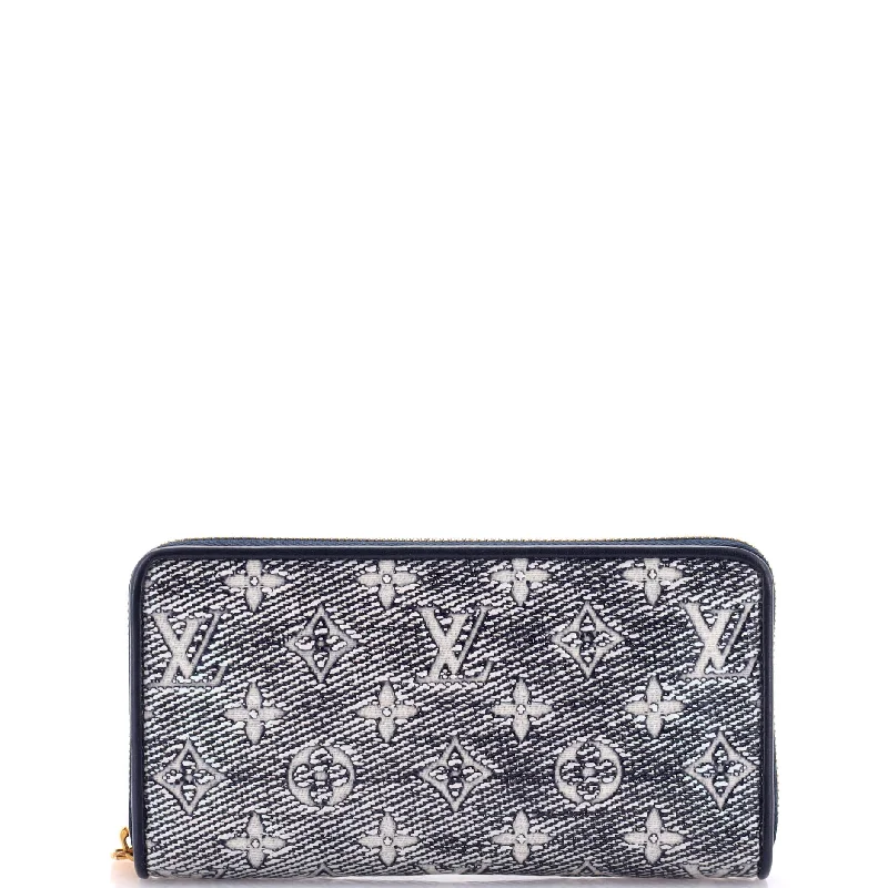 Women's money clip with a keychain attachmentZippy Wallet Monoglam Jacquard Canvas Women's money clip with a keychain attachmentZippy Wallet Monoglam Jacquard Canvas