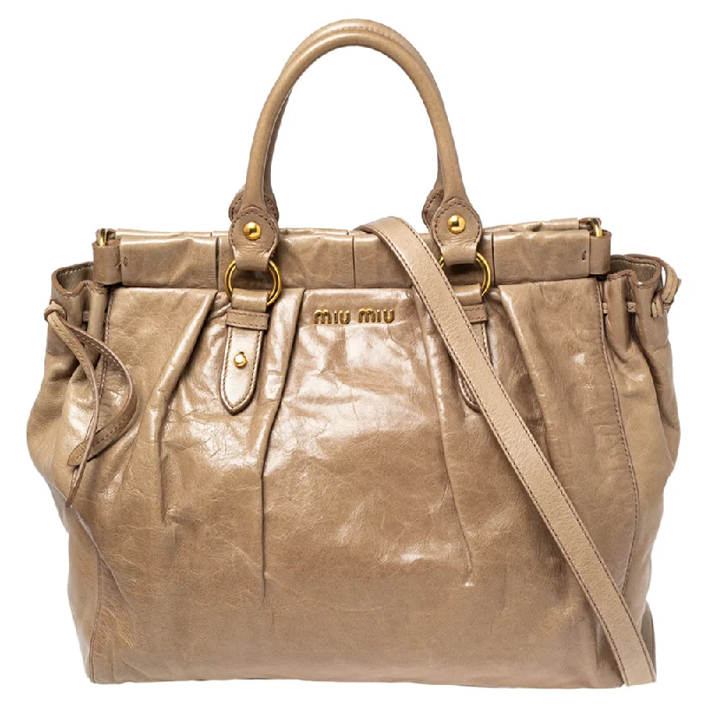 Quilted Tote Bag in Cream with Silver Hardware for a Classic and Sophisticated StyleMiu Miu Beige Leather Gathered Tote Quilted Tote Bag in Cream with Silver Hardware for a Classic and Sophisticated StyleMiu Miu Beige Leather Gathered Tote