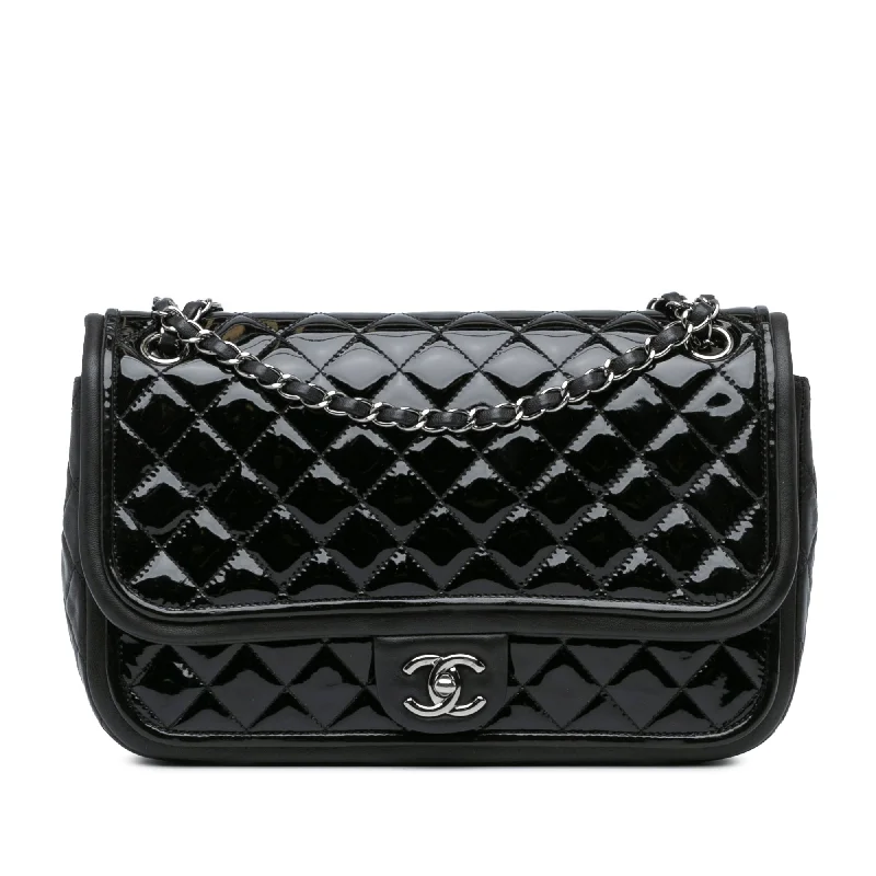 Canvas and Leather Combo Shoulder Bag in Tan for a Rustic LookBlack Chanel Jumbo Patent Classic Twist Flap Shoulder Bag