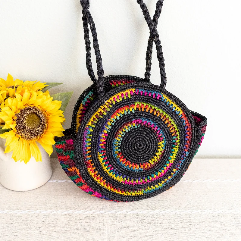 Women's Shoulder Bag with Fringe Details in Brown for a Bohemian StyleElena Handbags Round Raffia Woven Shoulder Bag Women's Shoulder Bag with Fringe Details in Brown for a Bohemian StyleElena Handbags Round Raffia Woven Shoulder Bag