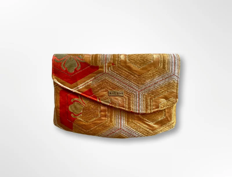 Suede Clutch with Tassel Details in Olive for Fall SoireesGold and Orange Kikkou Clutch