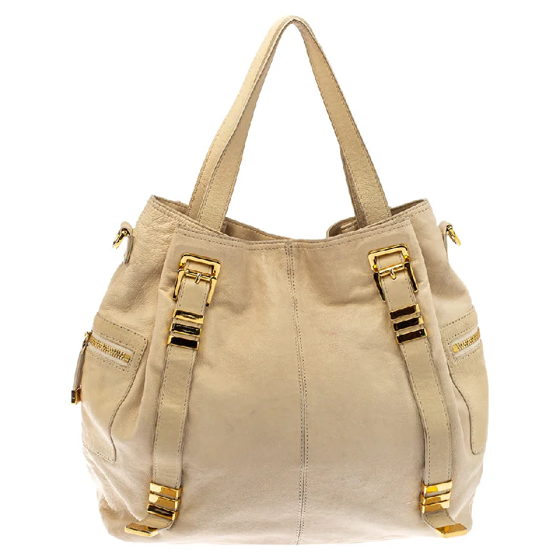 Canvas and Leather Combo Shoulder Bag in Tan for a Rustic LookMichael Kors Cream Leather Buckle Side Pocket Shoulder Bag Canvas and Leather Combo Shoulder Bag in Tan for a Rustic LookMichael Kors Cream Leather Buckle Side Pocket Shoulder Bag