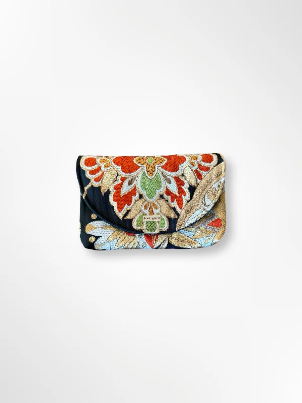 Snake - Skin Effect Clutch in Green for Exotic PartiesPaulownia Floral Clutch