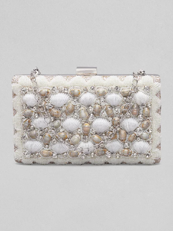 Women's Glittery Clutch in Blue for Disco - Themed EventsRubans Off White Coloured Clutch Bag With Shells And Embroided White Design. Women's Glittery Clutch in Blue for Disco - Themed EventsRubans Off White Coloured Clutch Bag With Shells And Embroided White Design.